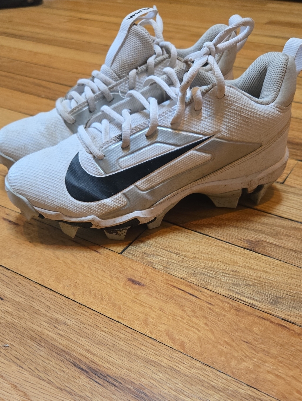 Nike Kids White Sneakers with Black Swoosh
